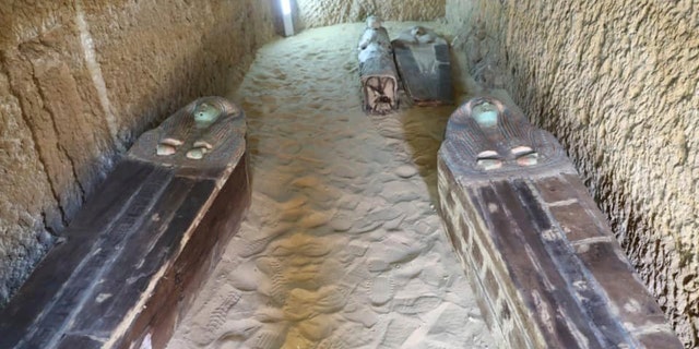 This photo provided by Ministry of Antiquities shows an uncovered part of ancient cemetery at an area by the famed pyramids at the Giza plateau just outside Cairo, Egypt, Saturday, May 4, 2019.
