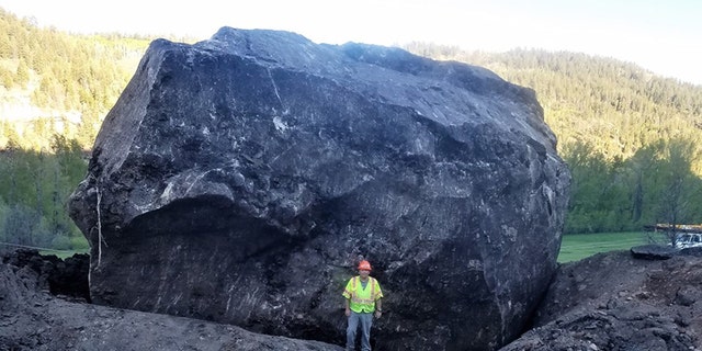 A "significant" rock fall left a pair of massive boulders along Colorado Highway 145 about 12 miles north of Dolores on Friday afternoon, according to officials.