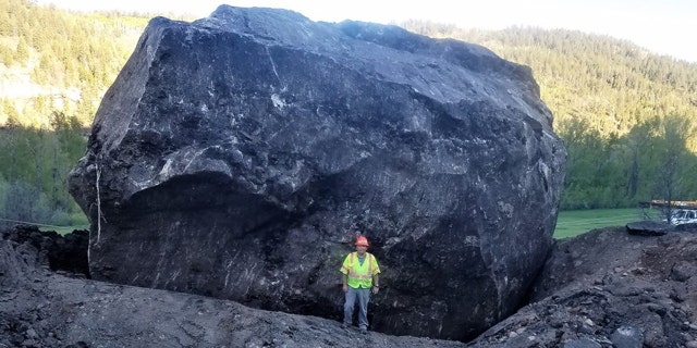 A "significant" rock fall left a pair of massive boulders along Colorado Highway 145 about 12 miles north of Dolores on Friday afternoon, according to officials.