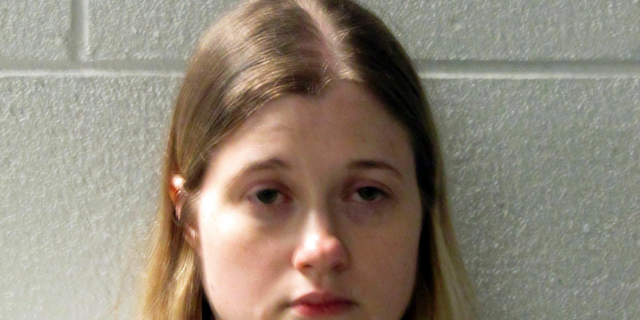 CORRECTS NAME TO KRISTA NOELLE MADDEN, NOT KRISTA LOWELL GRIFFIN - This photo made available by the Henderson County Sheriff's Office, N.C., shows Krista Noelle Madden who was arrested on Friday, May 10, 2019. Her claim that her 7-week-old baby was kidnapped quickly unraveled after the infant was found at the bottom of a 75-foot ravine in the North Carolina mountains, law enforcement officials said Friday.  (Henderson County Sheriff's Office via AP)