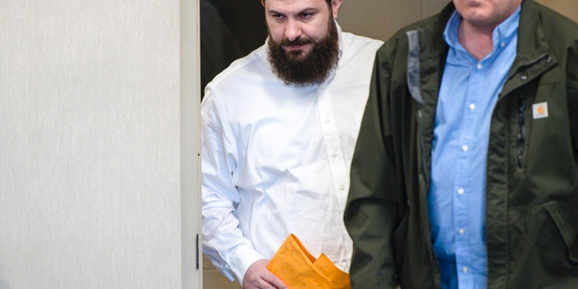 FILE - In this May 9, 2019 file Steven Bourgoin arrives for his murder trial in Vermont Superior Court in Burlington, Vt. Bourgoin is facing five counts of second-degree murder for a crash that killed five teenagers on I-89 in Williston in 2016. (Glenn Russell/VTDigger.org via AP, Pool, File)