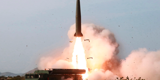 FILE - This May 4, 2019, file photo provided by the North Korean government shows a launch of a missile in the east coast of North Korea. Experts say North Korea’s latest launches suggest it may have acquired or cloned a short-range missile the Russian military has long earmarked for export. It’s still unclear if the North bought them or built them itself, but experts say the missiles it launched over the past week look just like a nuclear-capable ballistic missile that has long been a source of tension in Europe. Korean language watermark on image as provided by source reads: "KCNA" which is the abbreviation for Korean Central News Agency. (Korean Central News Agency/Korea News Service via AP, File)