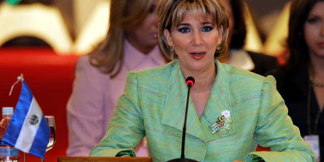 FILE - In this Sept. 29, 2005, file photo, El Salvador's First Lady Ana Ligia Mixco de Saca attends a session of XIII First Ladies Conference in Asuncion. The former first lady who had confessed her responsibility in the laundering of 25 million dollars taken from public funds, retracted her confession when prosecutors demanded on Monday, May 13, 2019, that she return 17.3 million dollars of the missing money. (AP Photo/Jorge Saenz, File)