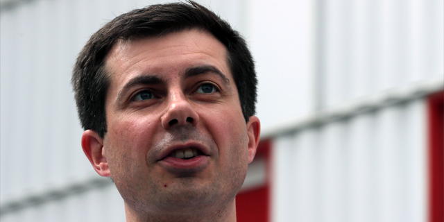 FILE - In this April 19, 2019, file photo, Democratic presidential candidate South Bend Mayor Pete Buttigieg during a campaign stop at a dairy company in Londonderry, N.H. The relatively few Democratic presidential candidates from red states have taken different approaches to convincing voters that a familiarity with Donald Trump country could help them denying him a second term. (AP Photo/Charles Krupa, File)
