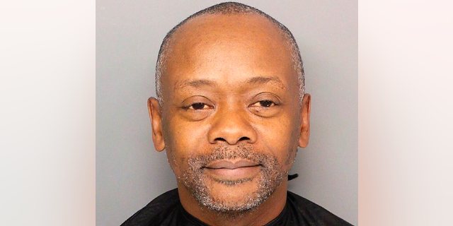 This undated photo provided by the Greenville Police Department in South Carolina shows Brian Keith Munns. Authorities said Monday, May 6, 2019, they have arrested Munns, who they say stabbed an 80-year-old woman to death in her South Carolina home more than 30 years earlier. (Greenville Police Department via AP)