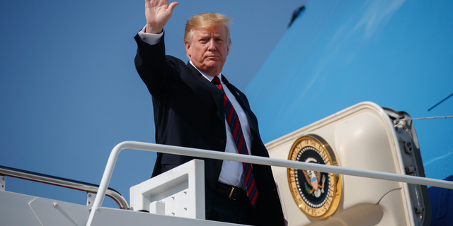 President Donald Trump waves as he boards Air Force One for a trip to New York to attend a fundraiser, Thursday, May 16, 2019, at Andrews Air Force Base, Md. (AP Photo/Evan Vucci)
