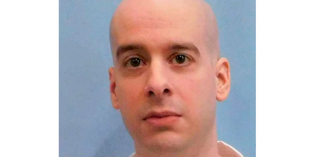FILE - This photo provided by the Alabama Department of Corrections shows Michael Brandon Samra. Alabama Gov. Kay Ivey refused a reprieve for Samra, an inmate set for execution Thursday, May 16, 2019, night for a quadruple killing that occurred after a dispute over a pickup truck, the prisoner's lawyer said. (Alabama Department of Corrections via AP)