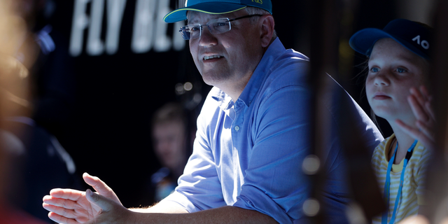FILE - In this Jan 20, 2019, file photo, Australian Prime Minister Scott Morrison watches the fourth round match between Australia's Ashleigh Barty and Russia's Maria Sharapova on Rod Laver Arena at the Australian Open tennis championships in Melbourne, Australia. Saturday, May 18, 2019 is the last possible date that Morrison could have realistically chosen to hold an election. (AP Photo/Mark Schiefelbein, File)