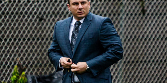 New York City police officer Daniel Pantaleo leaves his house Monday, May 13, 2019, in Staten Island, N.Y. A long-delayed disciplinary trial began Monday for Pantaleo, accused of using a banned chokehold in the July 2014 death of Eric Garner. (AP Photo/Eduardo Munoz Alvarez)