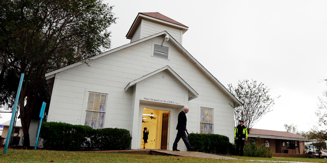 FILE - In this Nov. 12, 2017, file photo, a man walks out of the memorial for the victims of a shooting at Sutherland Springs First Baptist Church in Sutherland Springs, Texas. A South Texas church where a gunman in 2017 opened fire and killed more than two dozen congregants will unveil a new sanctuary and memorial room honoring the victims. Worshippers and relatives of those killed or injured at the First Baptist Church in Sutherland Springs are expected to gather at the newly constructed church on Sunday, May 19, 2019. (AP Photo/Eric Gay, File)