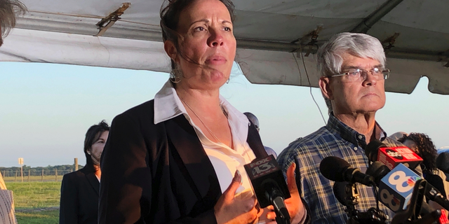 Lisa Noland, who survived an attack at the hands of serial killer Bobby Joe Long, speaking to reporters after his execution. (AP Photo/Brendan Farrington)