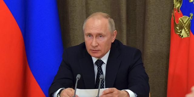 Russian President Vladimir Putin chairs a meeting of Russian military aviation in the Black Sea resort of Sochi, Russia, Wednesday, May 15, 2019. (Alexei Druzhinin, Sputnik, Kremlin Pool Photo via AP)