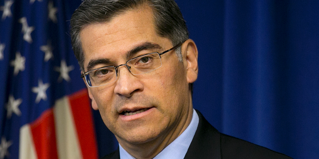 FILE - In this Jan. 24, 2018, file photo California Attorney General Xavier Becerra talks during a news conference in Sacramento, Calif. The California attorney general’s office will review how all 12 Roman Catholic dioceses in the state handled allegations of child sexual abuse that have resulted in payouts of hundreds of millions of dollars to victims. Attorney General Becerra sent out letters to the dioceses on Thursday, May 2, 2019, Sacramento diocese spokesman Kevin Eckery told the Sacramento Bee. (AP Photo/Rich Pedroncelli, File)