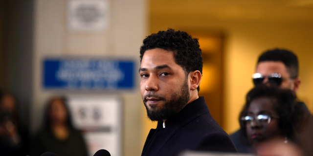 In this March 26, 2019 file photo, Actor Jussie Smollett talks to the media before leaving Cook County Court after his charges were dropped, in Chicago. He now faces new charges following an investigation.