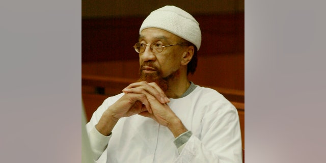 FILE- In this March 11, 2002 file photo, Jamil Abdullah Al-Amin watches during the sentencing portion of his trial in Atlanta. Al-Amin, the militant civil rights leader known in the 1960s as H. Rap Brown who was convicted of killing Fulton County Sheriff's Deputy Ricky Kinchen and wounding Deputy Aldranon English in a shootout in March 2000, is challenging his imprisonment, saying his constitutional rights were violated at trial. (AP Photo/Ric Feld, File)