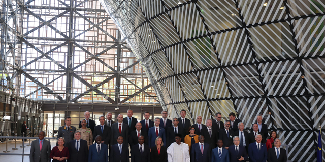European Union foreign policy chief Federica Mogherini, front row center, poses along with ministers for a group photo after an EU Foreign and Defense Ministers meeting with their counterparts of the G5 Sahel countries at the European Council headquarters in Brussels, Tuesday, May 14, 2019. (AP Photo/Francisco Seco)