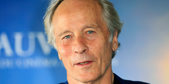 FILE - In this Sept. 3, 2013 file photo, American novelist and short story writer Richard Ford poses during a photo call at the 39th American Film Festival in Deauville, Normandy, western France. Ford, whose novels include the Pulitzer Prize-winning “Independence Day,” is being honored by the Library of Congress. Librarian of Congress Carla Hayden announced Thursday, May 16, 2019, that Ford has won the library’s Prize for American Fiction. He will be presented the award Aug. 31, during the National Book Festival, which takes place in Washington, D.C. (AP Photo/Lionel Cironneau, File)