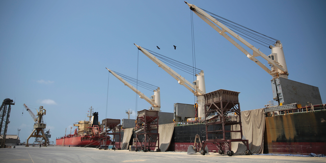 FILE - This Sept. 29, 2018 file photo shows idle cargo and oil tanker ships at the port of Hodeida, Yemen. On Saturday, May 11, 2019, Houthi rebels began a long-delayed withdrawal of their forces from the key port city, the group said, following the terms of a cease-fire. The U.N.-brokered agreement is aimed at alleviating the world’s worst humanitarian crisis. (AP Photo/Hani Mohammed)