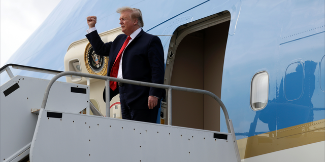 President Donald Trump arrives at Tyndall Air Force Base to view damage from Hurricane Michael, and attend a political rally, Wednesday, May 8, 2019, in Tyndall Air Force Base, Fla. (AP Photo/Evan Vucci)