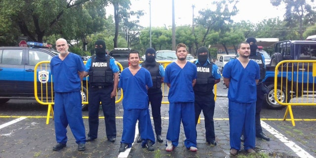 In this Oct. 17, 2018 photo, provided by the Nicaraguan National Police, prisoners detained and imprisoned during the recent uprisings against the government of President Daniel Ortega, are shown to the press in Managua, Nicaragua. At left is Eddy Antonio Montes Praslin, who was killed on Thursday, May 16, 2019, by a bullet in a prison north of the capital amid disturbances that left six prison officials injured, Nicaragua's interior ministry said. (Nicaraguan National Police via AP)
