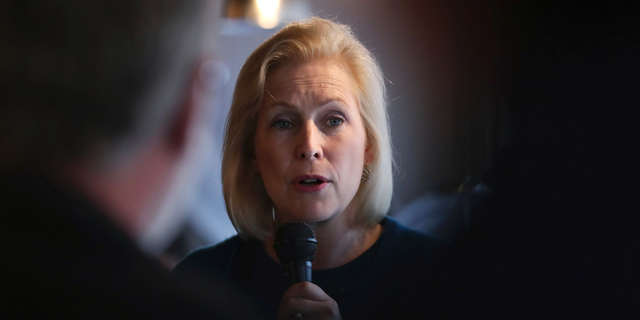 In this May 10, 2019, file photo, Democratic presidential candidate Sen. Kirsten Gillibrand, D-N.Y., talks with guests during a campaign stop at a coffee shop in Derry, N.H. (AP Photo/Charles Krupa, File)