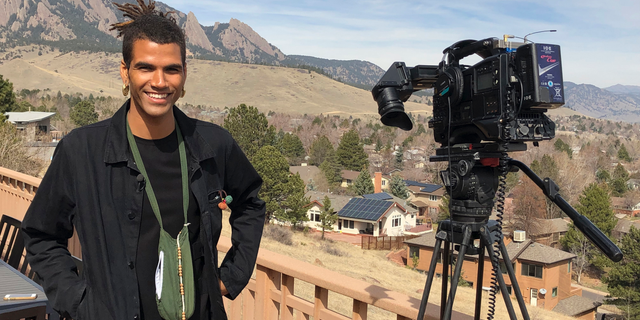 In this undated photo provided by lawyer Siddhartha Rathod, Zayd Atkinson poses for a photo. Atkinson was picking up trash outside his dormitory when a white police officer in Boulder, Colo., detained him in March, 2019. The officer, John Smyly, resigned this week under an agreement with city officials who found he had violated department policies. (Siddhartha Rathod via AP)