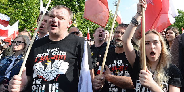 Thousands of Polish nationalists march to the U.S. Embassy, in Warsaw, Poland, Saturday, May 11, 2019. Thousands of Polish nationalists have marched to the U.S. Embassy in Warsaw, protesting that the U.S. is putting pressure on Poland to compensate Jews whose families lost property during the Holocaust.
The protesters included far-right groups and their supporters. They said the United States has no right to interfere in Polish affairs and that the U.S. government is putting "Jewish interests" over the interests of Poland. The T-shirts read in Polish "This is Poland not Polin" (AP Photo/Czarek Sokolowski)
