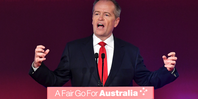 Opposition leader Bill Shorten speaks at the launch of Labor's federal election campaign at the Brisbane Convention and Exhibition Centre in Brisbane, Sunday, May 5, 2019. Australia's opposition party officially launched its election campaign putting health care and climate change at the forefront of its bid for election on May 18. (Darren England/AAP Image via AP)