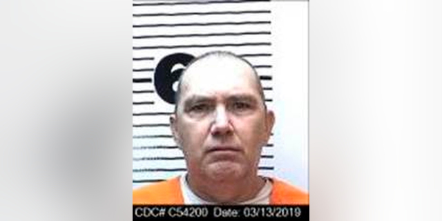 This March 13, 2019, booking photo released by the California Department of Corrections shows condemned inmate Brett Patrick Pensinger, C-54200, at San Quentin State Prison in San Quentin, Calif. State corrections officials say 56-year-old Pensinger died Thursday night, May 2, 2019, at a hospital. The specific cause of his death is pending. Pensinger was sentenced to San Quentin's death row in 1982 for killing a 5-month-old San Bernardino County girl. (California Department of Corrections via AP)
