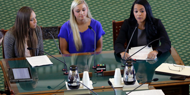 Former gymnasts Jordan Schwikert, left, Amy Baumann, center, and Tasha Schwikert, right, take part in a hearing about the statute of limitations child sex abuse victims have to sue their abusers, Monday, May 13, 2019, in Austin, Texas. In Texas, lawmakers quietly removed a bill's provision allowing child sex abuse victims to sue institutions and are now shielding the very groups that lobbied them to do so. (AP Photo/Eric Gay)