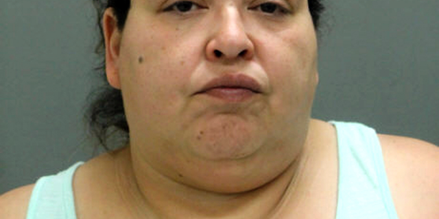 This booking photo provided by the Chicago Police Department, Thursday, May 16, 2019, shows Clarisa Figueroa, who is charged in the death of 19-year-old expectant mother Marlen Ochoa-Lopez. First-degree murder charges have been filed against Figueroa and her daughter Desiree Figueroa in connection with the death of Ochoa-Lopez, whose body was discovered earlier in the week, strangled before her baby was cut from her womb. (Chicago Police Department via AP)