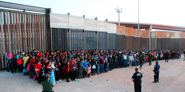 This May 29 photo released by U.S. Customs and Border Protection showed some of 1,036 migrants who crossed the U.S.-Mexico border in El Paso, Texas, the largest that the Border Patrol says it has ever encountered. (U.S. Customs and Border Protection via AP)