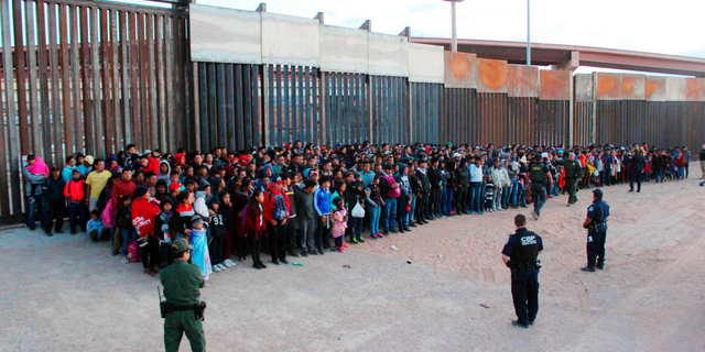 This May 29 photo released by U.S. Customs and Border Protection showed some of 1,036 migrants who crossed the U.S.-Mexico border in El Paso, Texas, the largest that the Border Patrol says it has ever encountered. (U.S. Customs and Border Protection via AP)