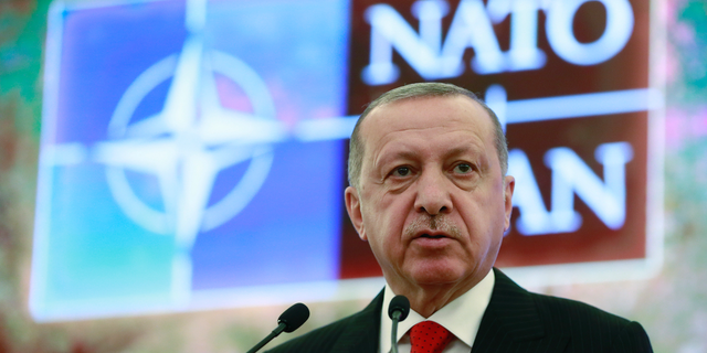 Turkey's President Recep Tayyip Erdogan addresses a meeting of the NATO's Mediterranean Dialogue, in Ankara, Turkey, Monday, May 6, 2019. Erdogan says Turkey's decision to purchase Russian-made S-400 missile defense systems does not mean that it is seeking "alternatives" in its relations with the West.