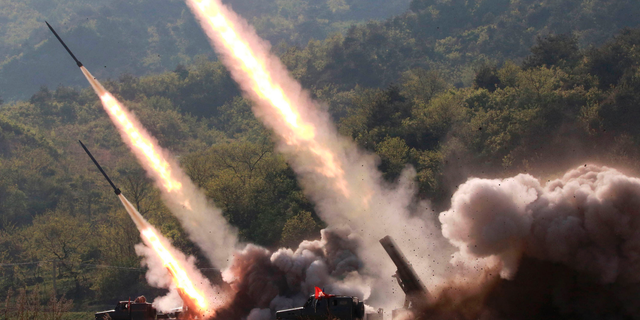 This Thursday, May 9, 2019, photo provided Friday, May 10, 2019, by the North Korean government shows a test of military weapon systems in North Korea. (Korean Central News Agency/Korea News Service via AP)