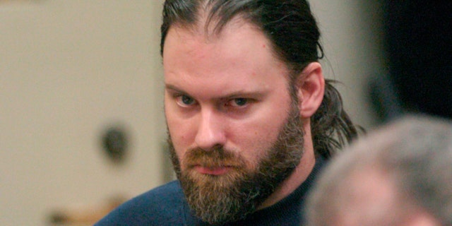 FILE - In this Jan. 26, 2006, file photo, Mark Hulett appears in Vermont District Court in Burlington, Vt. Hulett, whose initial 60-day sentence for a conviction of having sex with a child prompted a nation-wide outcry, is facing a federal charge of possession of child pornography. Federal court documents say 48-year-old Hulett, of Ferrisburgh, Vt., was charged Tuesday, May 14, 2019, after law enforcement agents searched his home. (Glenn Russell/The Burlington Free Press via AP, Pool, File)