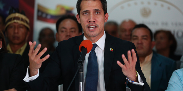 Venezuela's opposition leader and interim president Juan Guaido, speaks during a press conference at his campaign office in Caracas, Venezuela, Tuesday, May 14, 2019. Since declaring Venezuela's President Nicolas Maduro as illegitimate, Guaidó has been in the midst of a power struggle with Maduro. (AP Photo/Martin Mejia)