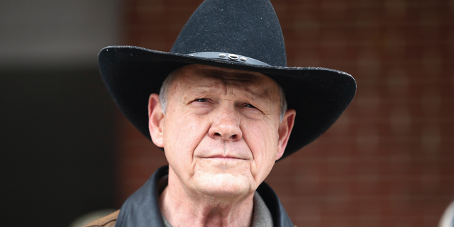 FILE - In this Dec. 12, 2017, file photo, Roy Moore speaks to the media after he rode in on a horse to vote in Gallant, Ala. Moore says he’s considering a fresh run for Senate in 2020. That’s prompting national Republican leaders to signal that they’d try again to prevent their party from nominating Moore, who’s denied long-ago sexual impropriety with teenagers. (AP Photo/Brynn Anderson, File)