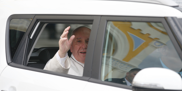 Pope Francis leaves after a meeting with the Catholic community in the Church of St. Michael Archangel, in Rakovsky, Bulgaria, Monday, May 6, 2019. Pope Francis is visiting Bulgaria, the European Union's poorest country and one that taken a hard line against migrants, a stance that conflicts with the pontiff's view that reaching out to vulnerable people is a moral imperative. (AP Photo/Darko Vojinovic)