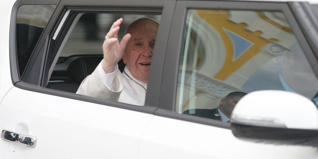 Pope Francis leaves after a meeting with the Catholic community in the Church of St. Michael Archangel, in Rakovsky, Bulgaria, Monday, May 6, 2019. Pope Francis is visiting Bulgaria, the European Union's poorest country and one that taken a hard line against migrants, a stance that conflicts with the pontiff's view that reaching out to vulnerable people is a moral imperative. (AP Photo/Darko Vojinovic)