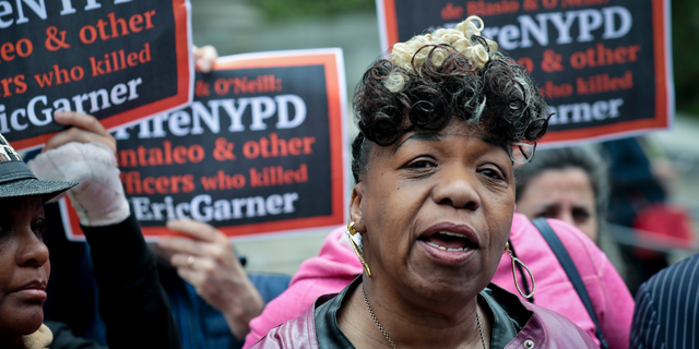 FILE - In this Thursday, May 9, 2019, file photo, Gwen Carr, left, mother of Eric Garner, an unarmed black man who died as he was being subdued in a chokehold by police Officer Daniel Pantaleo nearly five years earlier, speaks during a news conference after leaving court in New York. A long-delayed disciplinary trial is set to begin, Monday, May 13, 2019, for the New York City police officer accused of using a banned chokehold in Garner's death in July 2014. (AP Photo/Bebeto Matthews, File)
