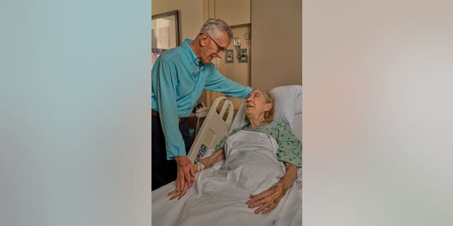 Dewhurst, pictured with Nall, said he felt moved to act once he saw her sign that read "I am type O and I need a kidney transplant. Please help me."