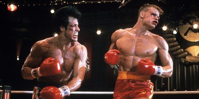 Sylvester Stallone punches Dolph Lundgren in a scene from the film "Rocky IV" in 1985.