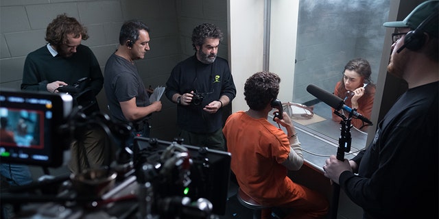 Filmmaker Joe Berlinger directs Zac Efron and Lily Collins.