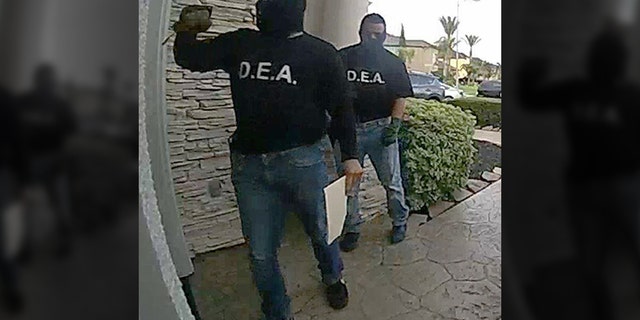 Pearland police are looking for two suspects who allegedly posed as DEA agents to get inside a house.