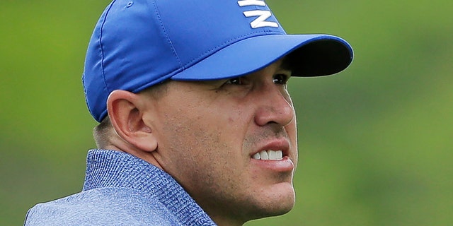 Brooks Koepka watches his shot off the sixth tee during the second round of the PGA Championship golf tournament, Friday, May 17, 2019, at Bethpage Black in Farmingdale, N.Y. (AP Photo/Seth Wenig)