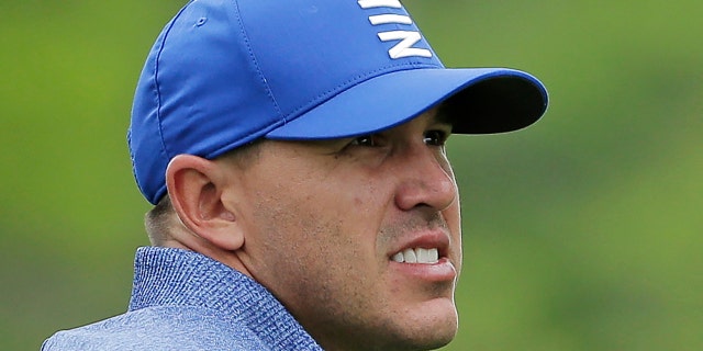Brooks Koepka watches his shot off the sixth tee during the second round of the PGA Championship golf tournament, Friday, May 17, 2019, at Bethpage Black in Farmingdale, N.Y. (AP Photo/Seth Wenig)