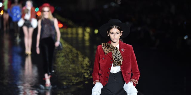 Model Kaia Gerber walks the runway during the Saint Laurent show as part of the Paris Fashion Week Womenswear Spring/Summer 2019 on September 25, 2018 in Paris, France. (Photo by Stephane Cardinale - Corbis/Corbis via Getty Images)
