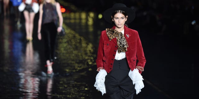 Model Kaia Gerber walks the runway during the Saint Laurent show as part of the Paris Fashion Week Womenswear Spring/Summer 2019 on September 25, 2018 in Paris, France. (Photo by Stephane Cardinale - Corbis/Corbis via Getty Images)