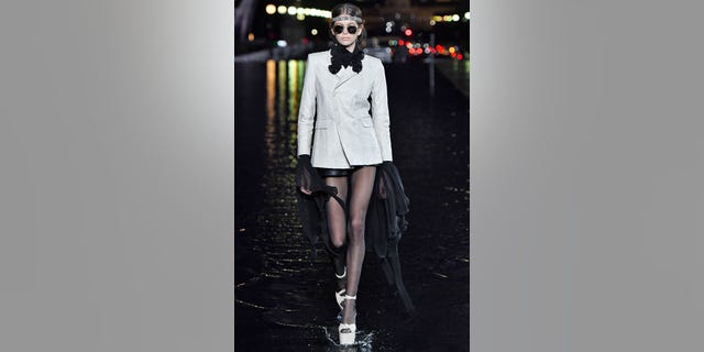 Kaia Gerber walks the runway during the Saint Laurent Ready to Wear show as part of the Paris Fashion Week Womenswear Spring/Summer 2019 on September 25, 2018 in Paris. (Photo by Victor VIRGILE/Gamma-Rapho via Getty Images)